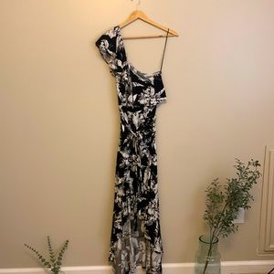 Medium one shoulder flowy dress. By Miami from Francescas.